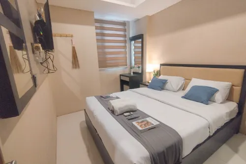 2BR near Marvell City Mall at Linden Apartment By Travelio