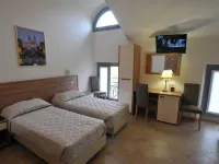 Hotel Montecarlo Hotels near Piola Station