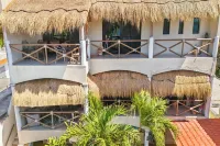 Spend the day at the Soggy Peso Palapa Bar, and spend the night in The Penthouse - Villas