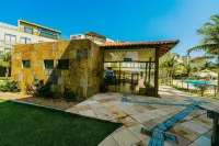Apto em Resort com Acesso Praia do Coqueiro - Apartemen