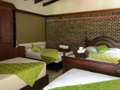 Comfortable Room with 3 Double Beds in Best Area of Coffee Region