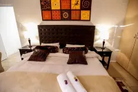 Secret Garden Guesthouse Hotels in Bloubergstrand