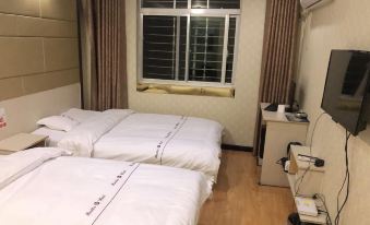 Wuchuan Xuanyi Business Hotel