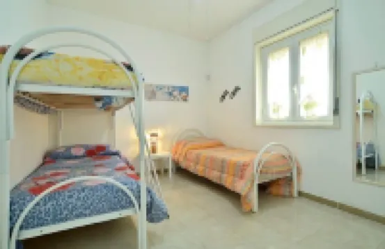 Villa at 20 m. from the sea on the beautiful and unspoiled beach of Carratois