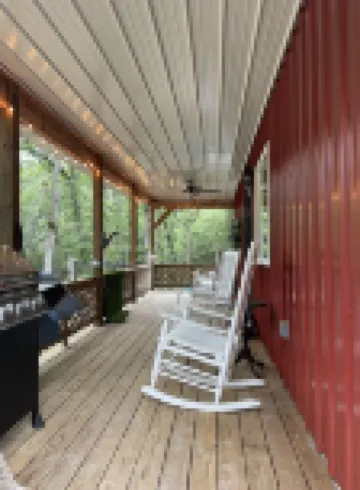 Cozy Cabin nestled on 10 acres just minutes from the lake and the speedway