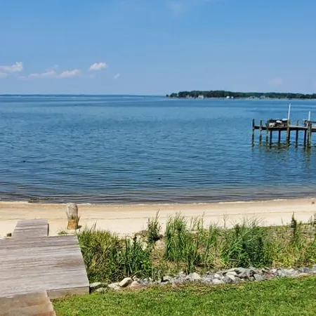 The Beach Retreat is a cozy beach Villa with Hottub overlooking a private beach.