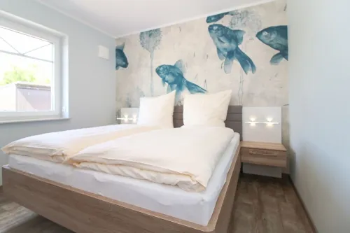 Modern first floor apartment with sauna and beach chair in the garden for 4 persons Hotels in Norden