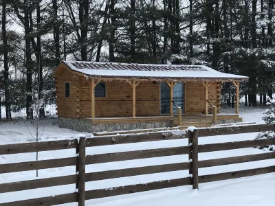Couples getaway TINY Log Cabin by the pine trees