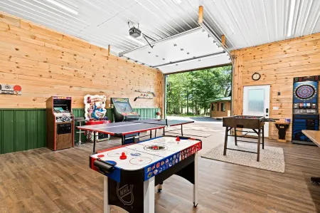 Secluded 4-season cabin w/private waterfront, epic game room & mins from trails