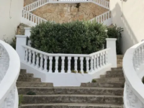 Modern apartment with a fantastic view over the bay Hotels in Cala en Porter