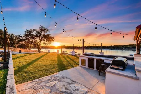 Lake Front Home with Pool, Dock, Views, Sports Court, & Beautiful Sunsets!