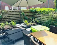 First class house close to the beach, fenced garden 8 adults + children