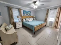 Beautiful Beach Home- 3 min walk to beach-Boat dock in back yard & private pool