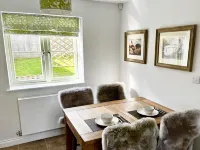 A beautifully themed Cotswold cottage with a modern but classic country interior