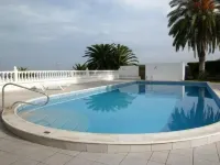 Comfortable home with a beautiful blooming garden and a view of the Atlantic