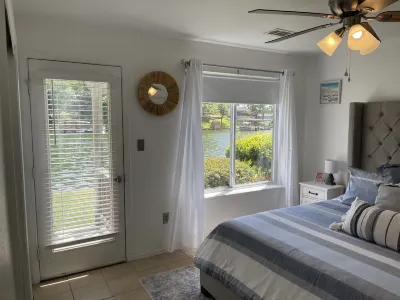 Relaxing Roost—lakefront condo located just steps away from the water’s edge!
