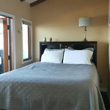 MAGNIFICENT OCEAN VIEW Hamilton Cove Condo With Golf Cart Included.