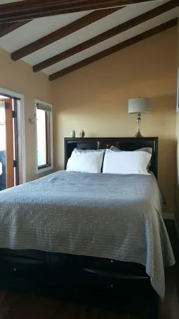 MAGNIFICENT OCEAN VIEW Hamilton Cove Condo With Golf Cart Included.