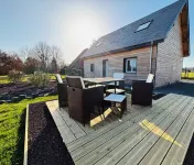 Beautiful wooden house with 3-star rating Hotels in Beuzeville