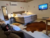 Grottbyn - Skånes Djurparks Camping Hotels in Rostanga