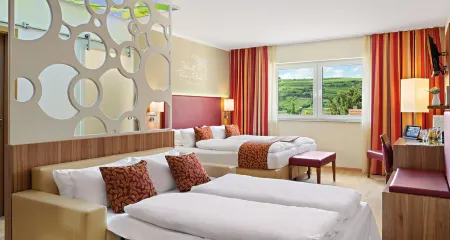 Pfalzhotel Asselheim Отели в г. Кирххаймболанде