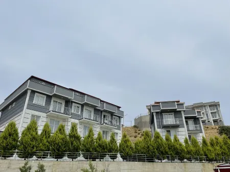 Trios Apart Отели в г. Гёкчеада