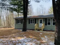 Cheerful 3 bedroom home on wooded acre. Near to Port Huron and Lake Huron.