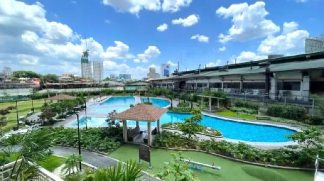 Cozy 2BR Condo Unit. Situated at the heart of metropolitan CBD's and Malls.