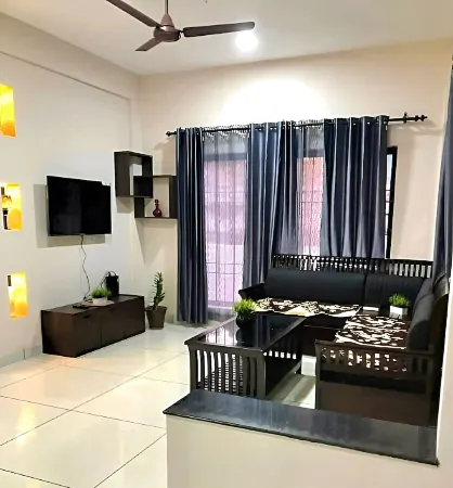 Urbane Cove 1: Furnished AC Apt Отели рядом с достопримечательностью «Mithrananthapuram Trimurti Temple»