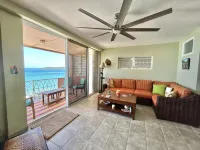 Caribbean Breeze Condo - hilltop breezes, views, convenience to beach & more!