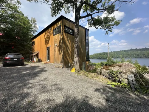 Modern Glass Cottage facing Lake with Hot tub Hotels in Algonquin Highlands