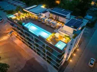 Cozy studio apartment near beach with roof top pool, AC, WiFi