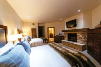 Deluxe Two Queen Room with Fireplace Hotel Room Hotels in Brighton