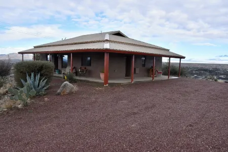 Unique top of the world straw bale cottage has ASTOUNDING views.