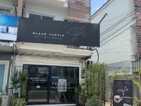 Black Turtle Hotels near Wat Si Sunthon