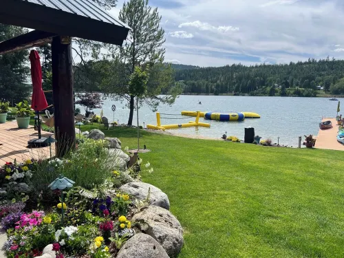 Waterfront Log Home | Private Dock | Expansive Beautiful Yard and Gardens - 4-Star