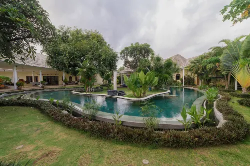 Villa Costa Sanur - سرير ووجبة إفطار