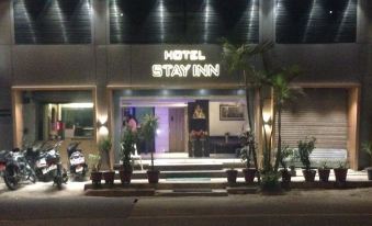 "the entrance to a hotel with a sign that reads "" hotel stay inn "" on the building" at Hotel Stay Inn
