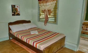 Basio's Place Tourist Inn by RedDoorz