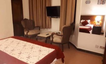 Puma Garden and Suites