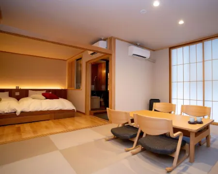 川のせせらぎの宿　旅館かねいし 小国町のホテル