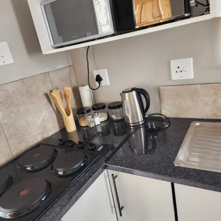 Khutsong Apartmentss Отели в г. Секунда