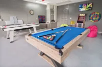 Waterfront Home with Pool,  Hot Tub, Dock, Game Room & 10 minutes to the Beach