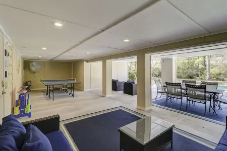 Lagoon-Front Retreat w/ Pool, Spa, Game Room & Private Dock Short Walk to Beach