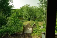 Cozy Riverfront Cabin w/ Water Access, Fireplace, AC, Firepit