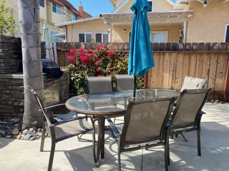 Cozy Beach Cottage w/ Private Patio – Walk to Beach, Pier, Dining & Shops