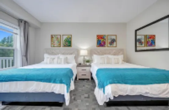 No Cleaning Fee! Brand New Double Queen Studio Condo w/ Waterfront Pool + Beach