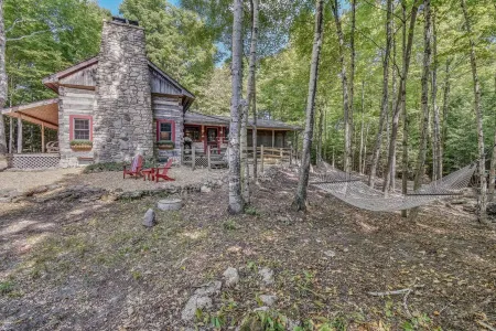 Hand Hewn Log Cabin Newly Renovated, rustic-modern design