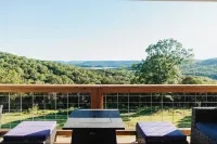 Huckleberry Hollow, secluded home in the woods, wraparound porch, soaker tub!