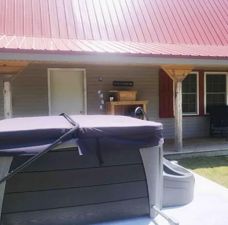 Converted barn with great views, hottub, pool table, shuffleboard & firepit.